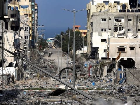 A damaged neighborhood following Israeli airstrikes on Gaza City.
