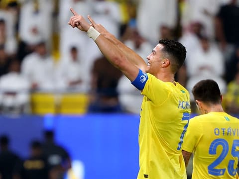 Nassr's Portuguese forward #07 Cristiano Ronaldo celebrates after scoring a goal during the AFC Champions League Group E football match between Saudi's al-Nassr and Qatar’s Al Duhail at the King Saud University Stadium in Riyadh.