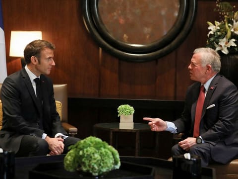 Jordan's King Abdullah meets with France's President Emmanuel Macron in Amman on October 25, 2023.  