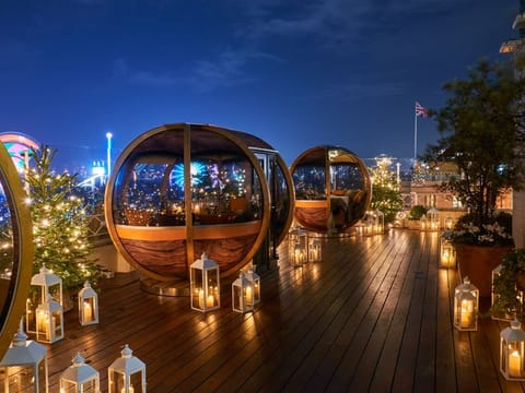 The Dorchester London during the winter holidays. Though Dorchester Collection, its parent brand, does not have a conventional loyalty program, it extends elite-style benefits to travelers who book through luxury travel specialists.