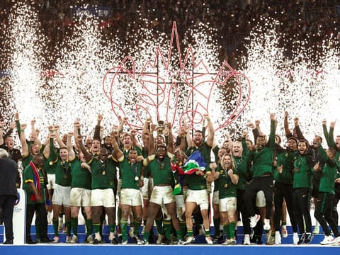 South Africa's Siya Kolisi lifts The Webb Ellis Cup as they celebrate winning the world cup final against New Zealand at Stade de France, Saint-Denis, France on Saturday.
