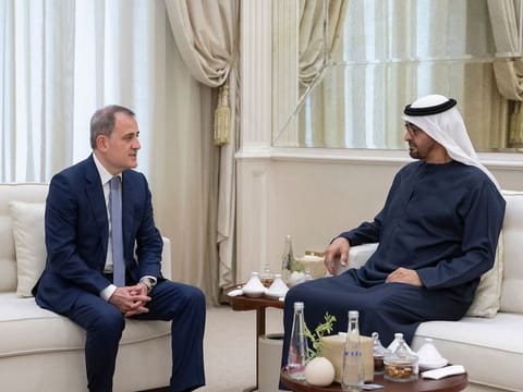 Sheikh Mohamed (R) meets with Jeyhun Bayramov, Foreign Minister of Azerbaijan (L), at the Sea Palace.
