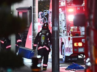 Photos: Japan police detain hostage-taker after hours-long standoff