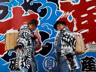 Photos: Samurai trash collectors clean Tokyo streets after Halloween revels