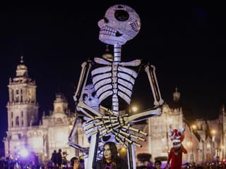Photos: Thousands flock to Day of the Dead parade in Mexico City