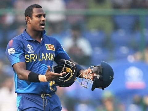Sri Lanka's Angelo Mathews reacts after he was timed out during the 2023 ICC Men's Cricket World Cup match against Bangladesh at the Arun Jaitley Stadium in New Delhi on November 6, 2023.  
