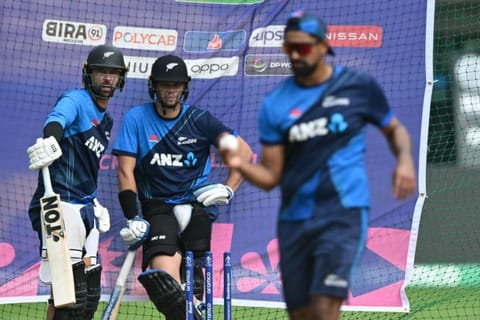 New Zealand's Devon Conway (left) and Tom Latham prepare to bat at the nets during a training session at the M. Chinnaswamy Stadium in Bengaluru on Wednesday.