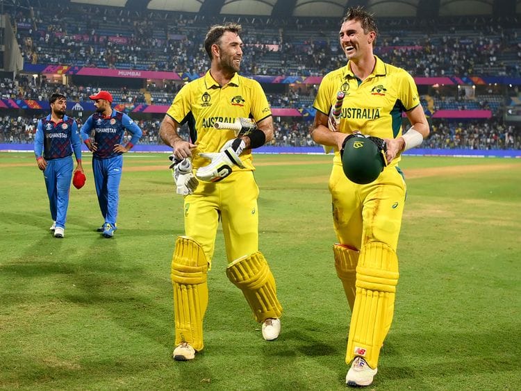 Glenn Maxwell (left) and captain Pat Cummins 