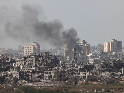 This picture taken from the Israeli side of the border with the Gaza Strip on November 10, 2023 shows billowing smoke following the Israeli bombardment of the Gaza Strip, amid ongoing battles between Israel and the Palestinian Hamas movement. 