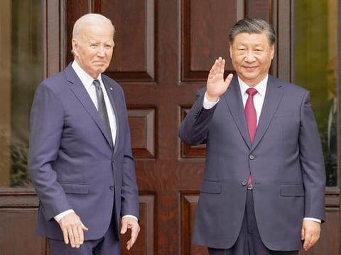 Chinese President Xi Jinping waves as he meets with US President Joe Biden at Filoli estate on the sidelines of the Asia-Pacific Economic Cooperation (APEC) summit, in Woodside, California, on November 15, 2023. 