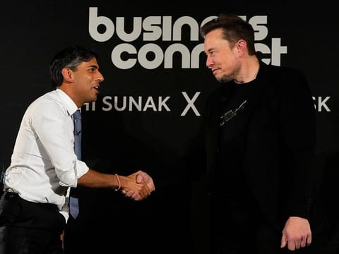 British Prime Minister Rishi Sunak shakes hands with Tesla and SpaceX's CEO Elon Musk after an in-conversation event, in London, Britain, Thursday, Nov. 2, 2023. 