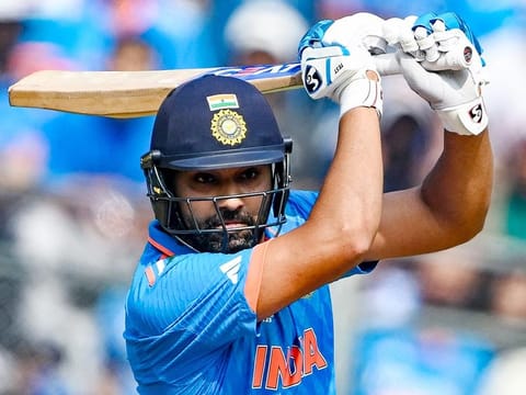 India's captain Rohit Sharma watches the ball after playing a shot during the 2023 ICC Men's Cricket World Cup semi-final match against New Zealand at the Wankhede Stadium in Mumbai on November 15, 2023.  