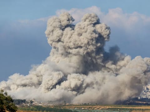 Smoke rises following an airstrike in Gaza, as seen from southern Israel, amid the ongoing conflict between Israel and the Palestinian group Hamas, on November 16, 2023.  
