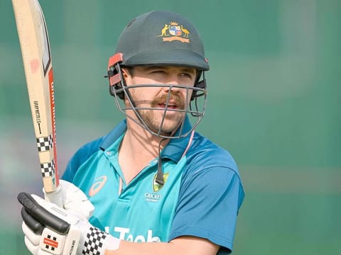 Australia's Travis Head looks on during a practice session on the eve of their 2023 ICC Men's Cricket World Cup final match against India at the Narendra Modi Stadium in Ahmedabad on November 18, 2023.  