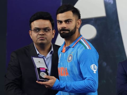 India’s Virat Kohli shows the runners-up medal after India lost the ICC Cricket World Cup final at the Narendra Modi Stadium in Ahmedabad on November 19, 2023. Australia won the final by six wickets.