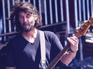 Hollywood actor Keanu Reeves stuns on his bass guitar at Los Angeles concert