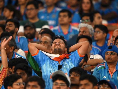 India fans react while watching the 2023 ICC Men's Cricket World Cup one-day international (ODI) final match between India and Australia at the Narendra Modi Stadium in Ahmedabad on November 19, 2023. 