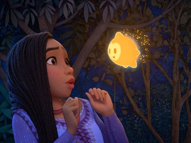 This image released by Disney shows Asha, voiced by Ariana DeBose, in a scene from the animated film "Wish." (Disney via AP)