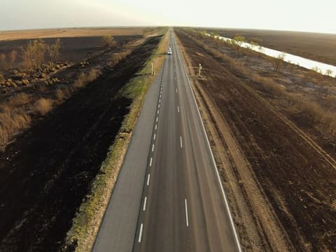 Home to more than 11.5 million people, Parana is ranked as one of the top-five performing states nationally with a yearly GDP of USD 130bn. [Pictured: The road linking the provinces of Santa Fe and Entre Rios]