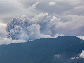 42 hikers unaccounted for as Indonesia volcano spews ash tower