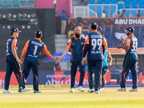 Samp Army players celebrate the wicket of Quinton de Kock of Delhi Bulls.