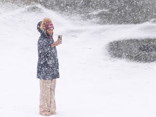 Photos: Flights delayed as snow and ice bring Europe to a standstill
