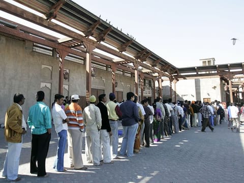 People queue up outside the Shiva Temple at Bur Dubai Creek.