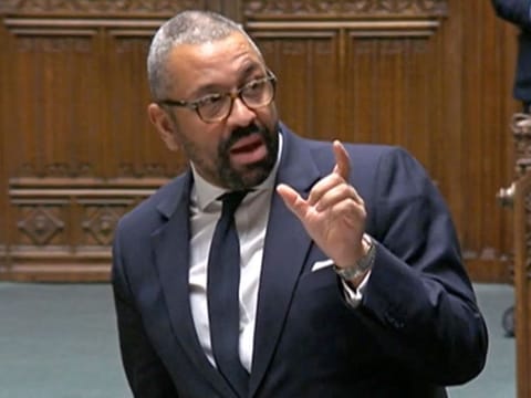 A video grab from footage broadcast by the UK Parliament's Parliamentary Recording Unit (PRU) shows Britain's Home Secretary James Cleverly opening the Safety of Rwanda (Asylum and Immigration) Bill: 2nd reading, in the House of Commons, in London on December 12, 2023.  