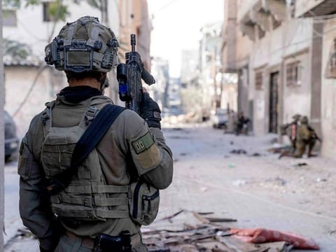 Israeli soldiers operate deep inside the Gaza Strip