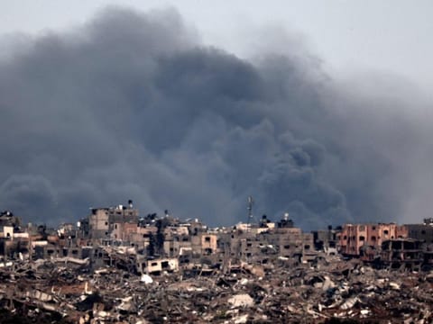 A picture taken from southern Israel near the border with the Gaza Strip on December 21, 2023, shows smoke billowing following Israeli bombardment in the Palestinian territory amid ongoing battles with the Palestinian Hamas militant group.  