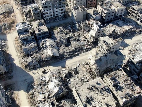  An aerial view on December 26, 2023 shows destroyed buildings in Beit Lahia following Israeli bombardments in the northern Gaza Strip.