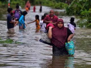 Photos: Six dead, tens of thousands hit by southern Thailand flooding