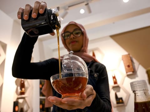 Beekeepers at the eighth edition of the ‘Hatta Honey Festival’, at Hatta Hall in Dubai.  27th December 2023 Photo:Ahmed Ramzan/Gulf News