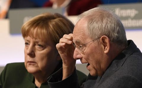 Merkel and Schaeuble at the general party conference of the Christian Democratic Union, CDU, in Essen, Germany, on December 7, 2016.  