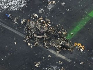 Japan crash probe: Coast guard plane not cleared for take-off