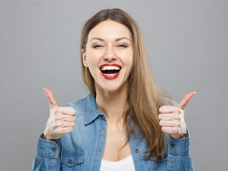 Person doing thumbs up