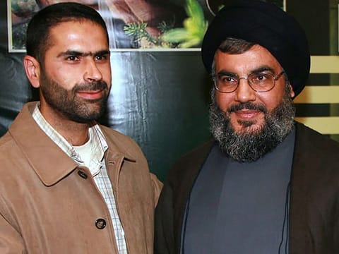 Wissam Al Tawil with Hassan Nasrallah in a file photo.