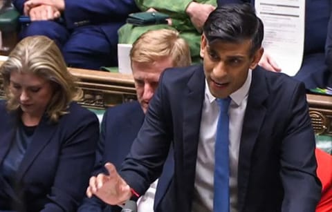A video grab from footage broadcast by the UK Parliament's Parliamentary Recording Unit (PRU) shows Britain's Prime Minister Rishi Sunak speaking during the first Prime Ministers Questions (PMQs) session of the year at the House of Commons, in London, on January 10, 2024.  
