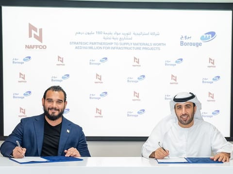 Ahmed Al Khatib, CEO of NAFFCO and Hazeem Sultan Al Suwaidi, CEO of Borouge PLC sign the Dh160 million agreement.  