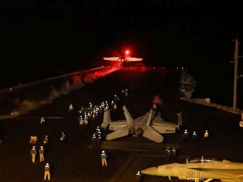 An aircraft takes off to join the US-led coalition to conduct air strikes against military targets in Yemen, aimed at the Houthi militia that has been targeting international shipping in the Red Sea, from an undisclosed location, in this handout picture released on January 12, 2024.