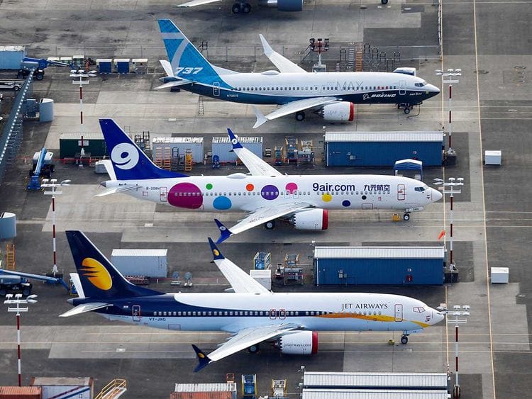 An aerial photo shows Jet Airways and 9 Air Boeing 737 MAX airplanes, as well as a 737 MAX 7, grounded at Boeing Field in Seattle, Washington, U.S. March 21, 2019.