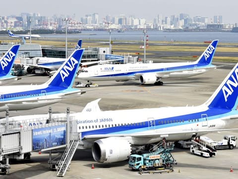 All Nippon Airways (ANA) airplanesat Haneda airport in Tokyo.  A passenger sunk his teeth into crew member’s arm while “heavily drunk”. The incident prompted pilots of the plane with 159 passengers on board to turn back over the Pacific to Haneda airport, where the man was handed over to police, according to ANA.