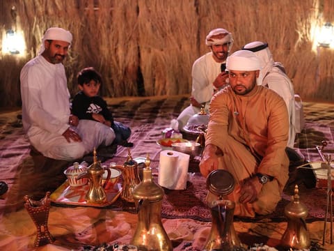 Preparing Arabic coffee the traditional way in social gatherings is part of Emirati culture 