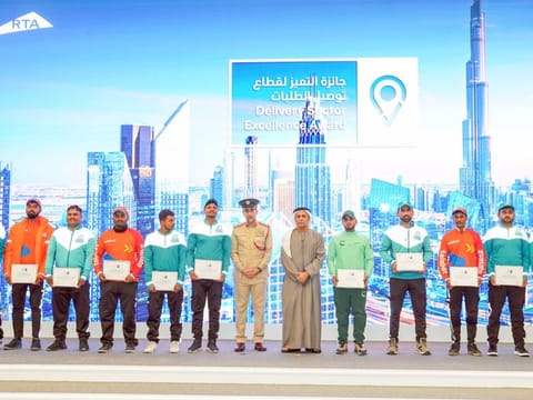 Mattar Al Tayer and Lieutenant General Abdullah Khalifa Al Marri at the ceremony to honour the best delivery riders in Dubai.