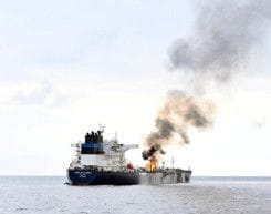 Smoke rises from Marlin Luanda, merchant vessel, after the vessel was struck by an Al Houthi anti-ship missile, at the location given as Gulf of Aden, in this handout picture released on January 27, 2024.  