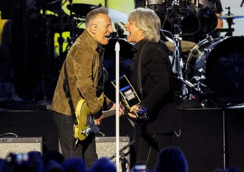 Honouree Jon Bon Jovi and Bruce Springsteen perform on stage during the MusiCares Person of the Year Gala in Los Angeles, California. 