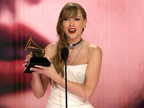 Taylor Swift at the 66th Grammy Awards, dressed in a custom Schiaparelli Haute Couture.