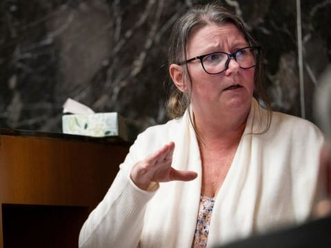Jennifer Crumbley, the mother of a Michigan boy who shot dead four high-school classmates in 2021, testifies on the stand in an Oakland County courtroom in Pontiac, Michigan, U.S., February 1, 2024. 