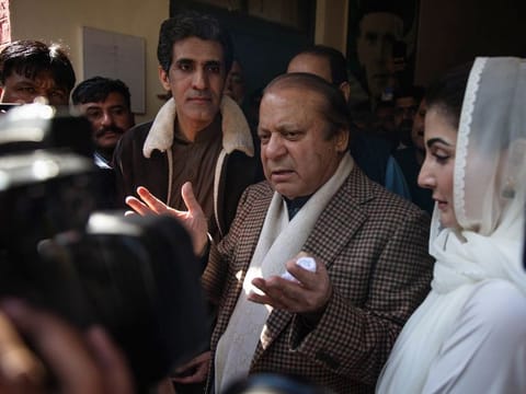 Nawaz Sharif, Pakistan’s former prime minister, and his daughter Maryam Nawaz Sharif at a polling station in Lahore on February 8, 2024.  