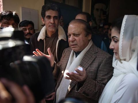 Nawaz Sharif, Pakistan’s former prime minister, and his daughter Maryam Nawaz Sharif at a polling station in Lahore on February 8, 2024.  